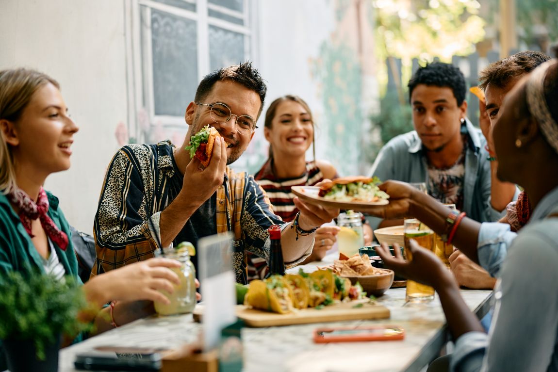 group of adults sharing a meal